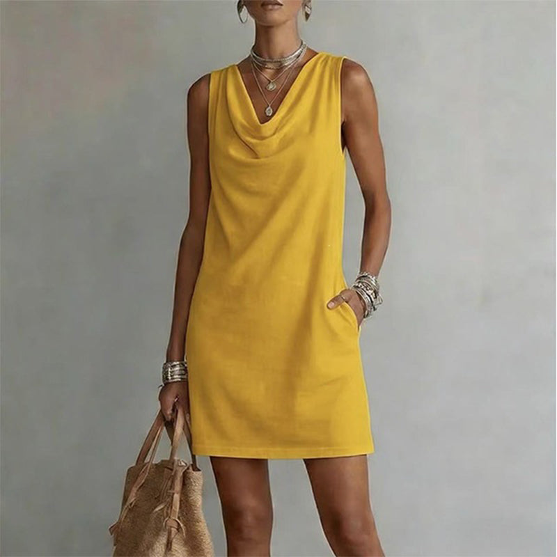 Vestido entallado con cuello barco – Sin mangas, con bolsillos laterales, muy versátil