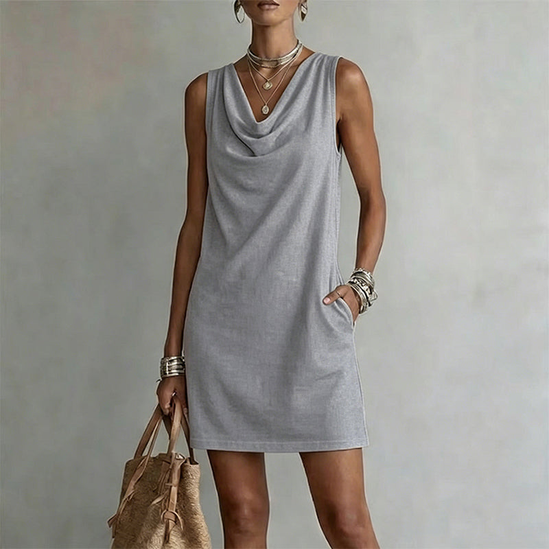 Vestido entallado con cuello barco – Sin mangas, con bolsillos laterales, muy versátil