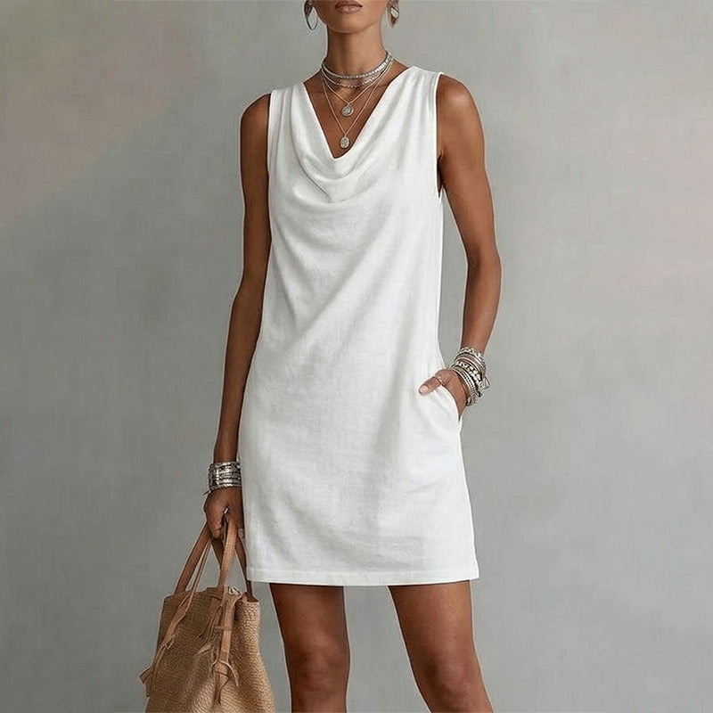 Vestido entallado con cuello barco – Sin mangas, con bolsillos laterales, muy versátil